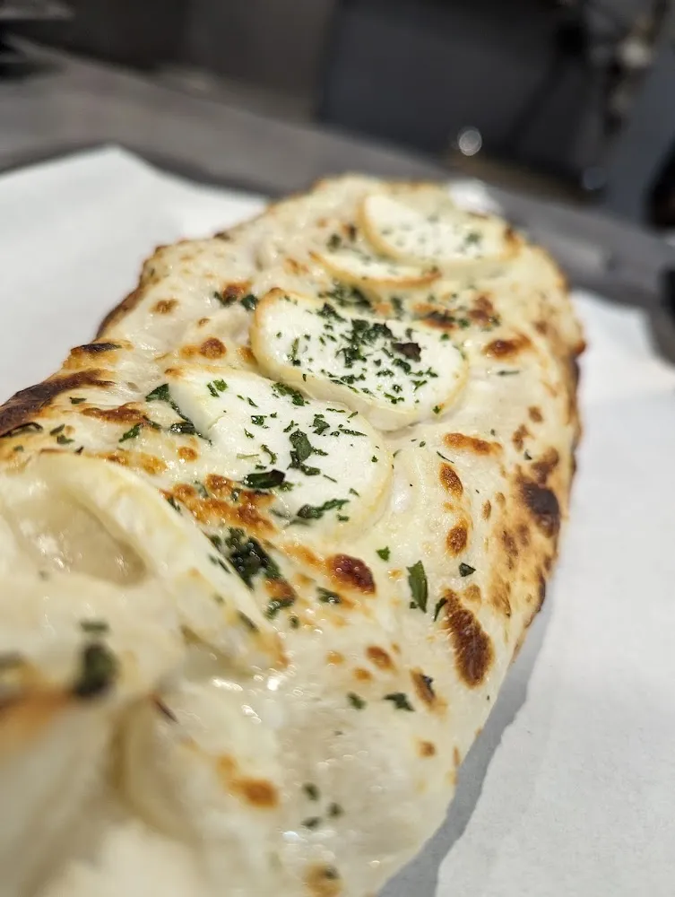 Panizza Poulet Curry Et Chèvre Chaud